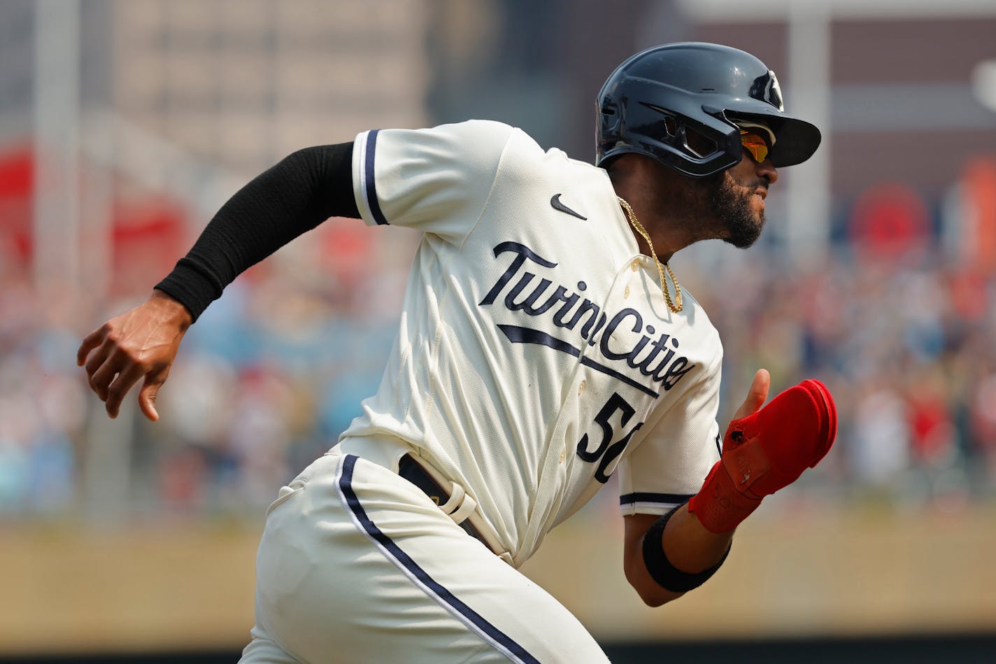 Minnesota Twins' Willi Castro runs on his way to scoring and tying a baseball game against the Chicago White Sox on a Alex Kirilloff double in the ninth inning Sunday, July 23, 2023, in Minneapolis. (AP Photo/Bruce Kluckhohn)