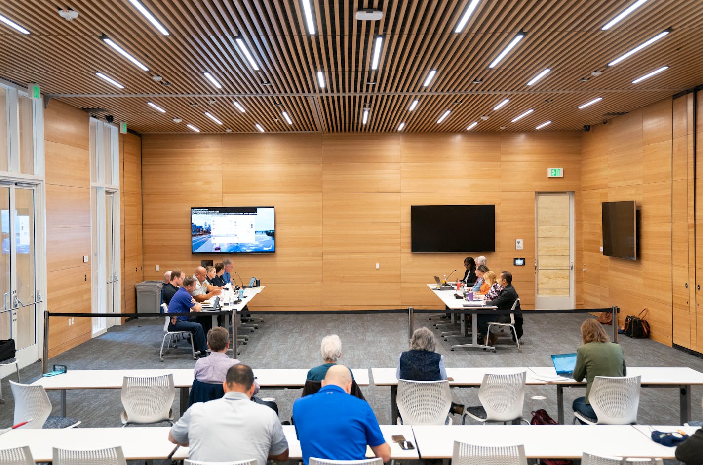 Representatives from Police Officers Federation of Minneapolis, left, and the city conduct their second public bargaining session over police contracts on September 27.