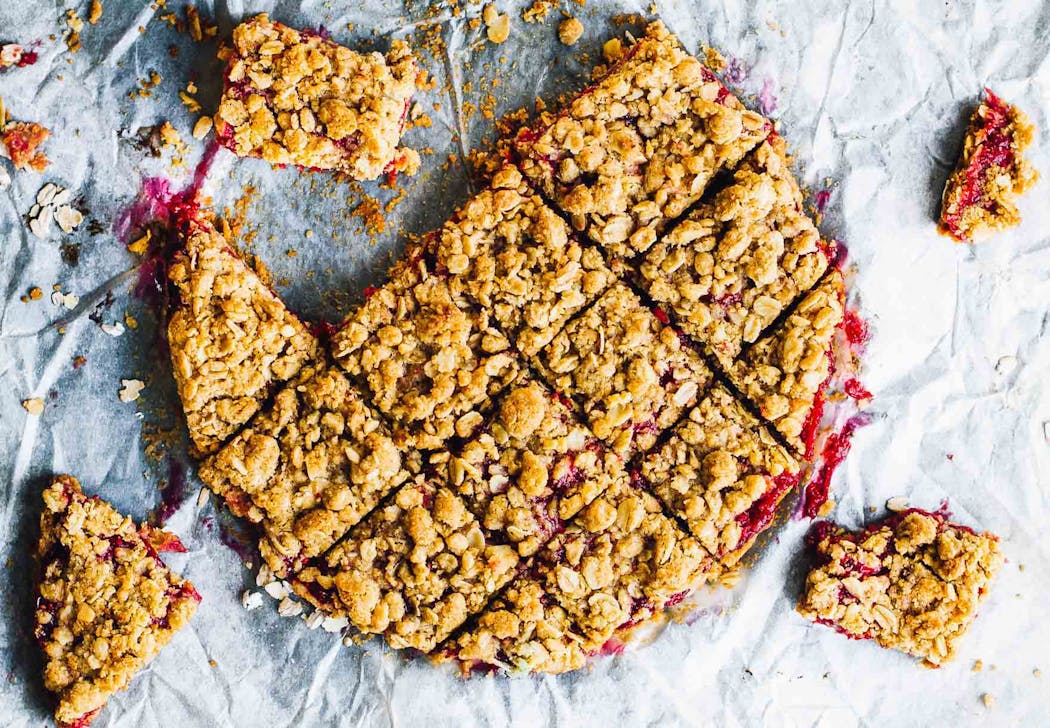 A taste of summer in a sweet oaty crust, these bars are gluten-free and can easily be made vegan.