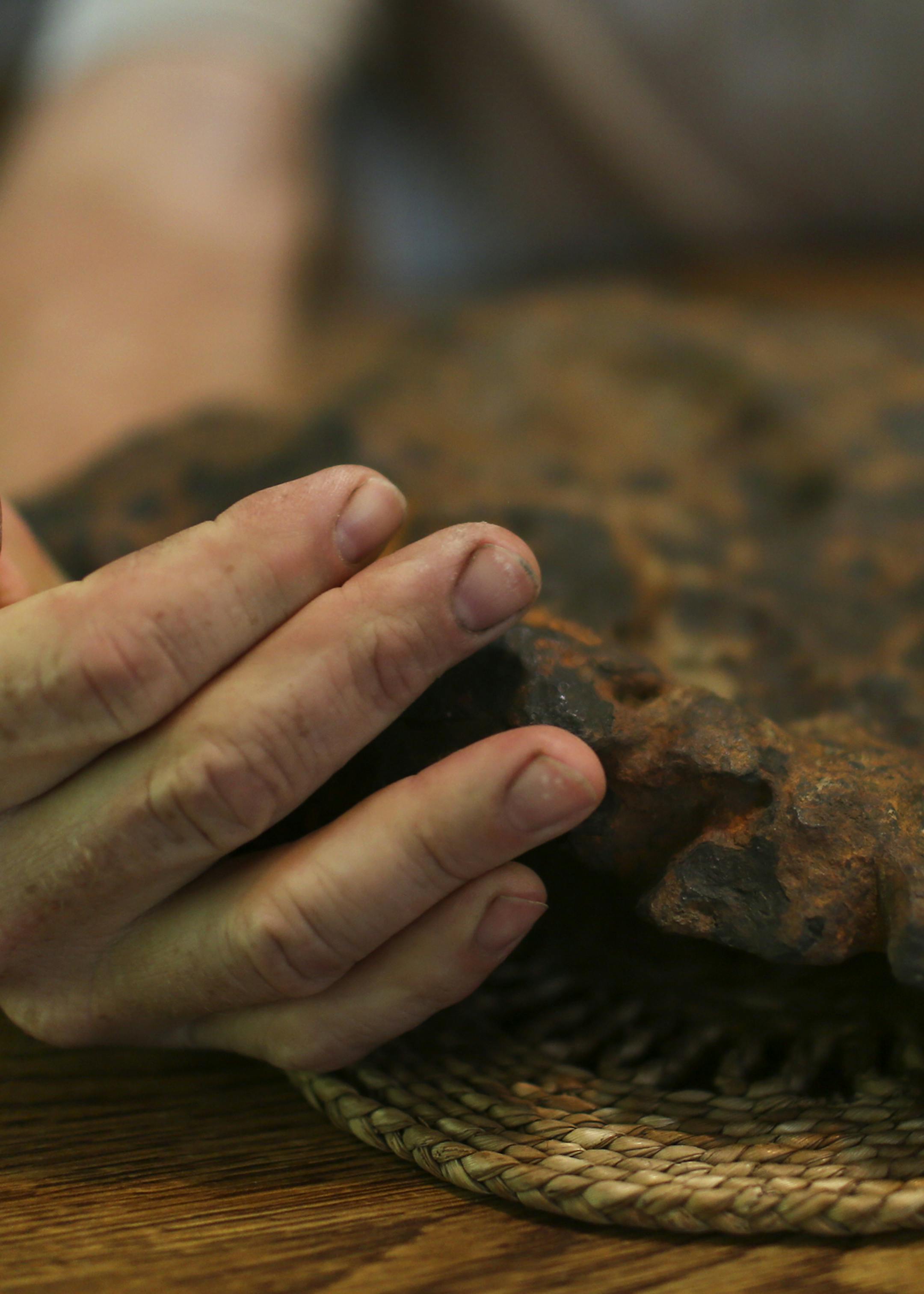 Bruce Lilienthal with the 30 plus pound meteor he found about two years ago while plowing a field and seen Wednesday, June 19, 2013, at the Lilienthal farm near Arlington, MN.](DAVID JOLES/STARTRIBUNE) djoles@startribune.com A Minnesota farmer has found a rare meteorite while plowing his field near Arlington. A University of Minnesota geology professor has confirmed that the 33-pound rock came from outer space, probably more than a century ago, and is likely 4.6 billion years old.**Bruce Lilient