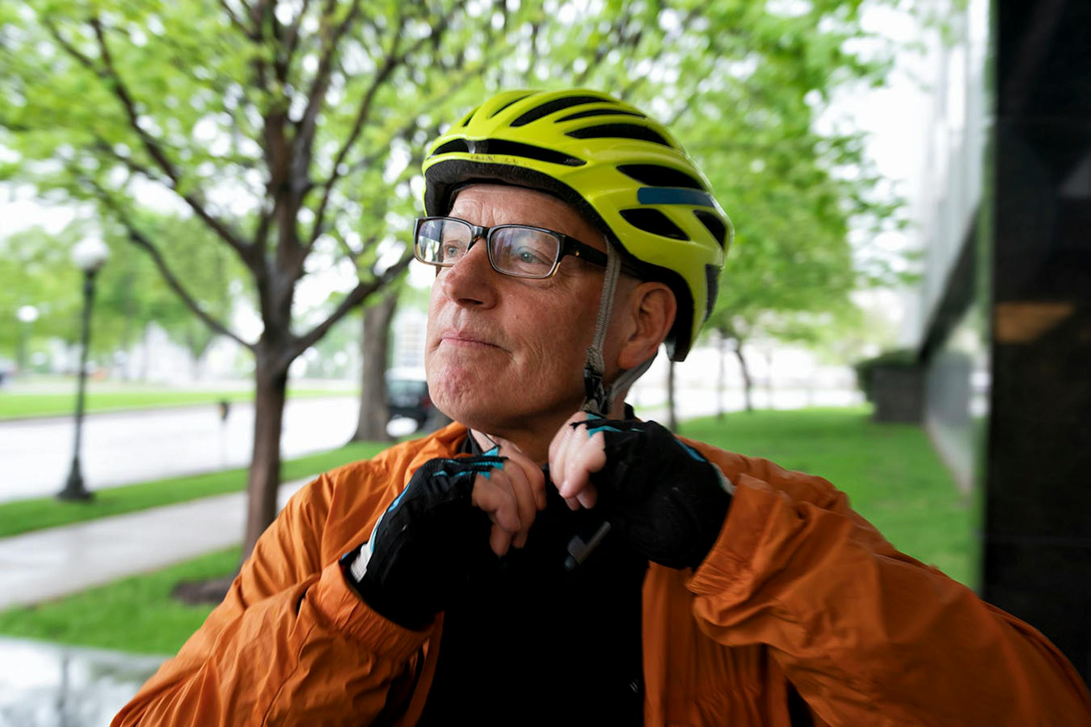Commissioner Frans changed from his suit into a rain jacket and shorts for the 13-mile bicycle ride home to Minneapolis.
