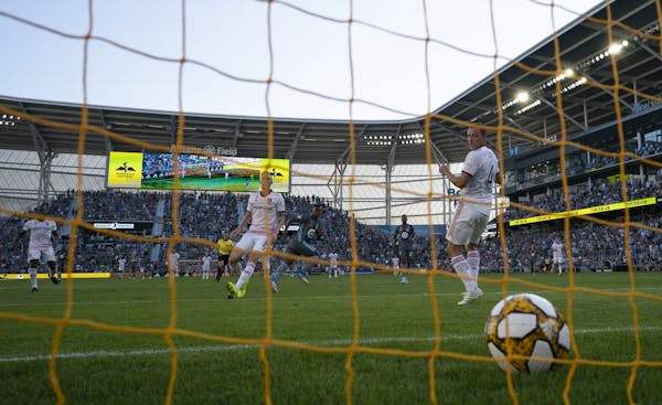 Minnesota United forward Carlos Darwin Quintero (25) watched his first half goal land in the net past Real Salt Lake defender Donny Toia (4), who was 