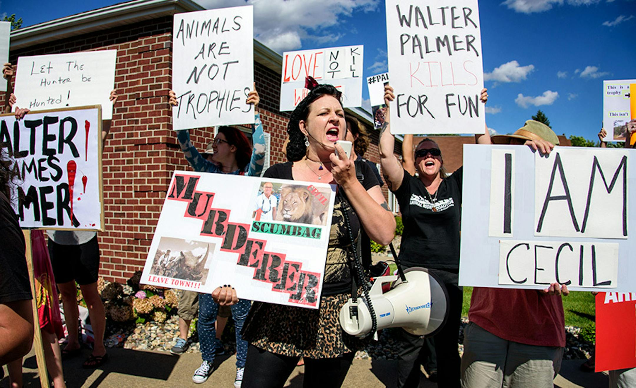 Rachel Augusta led a group of protestors from Animal Rights Coalition and Minnesota Animal Liberation gathered in front of Dr. Palmer's dental practice.