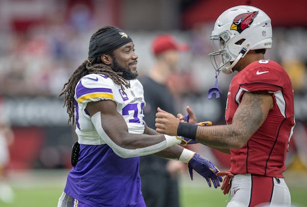 Vikings running back Dalvin Cook was greeted by Cardinals running back James Conner pregame on Sunday.