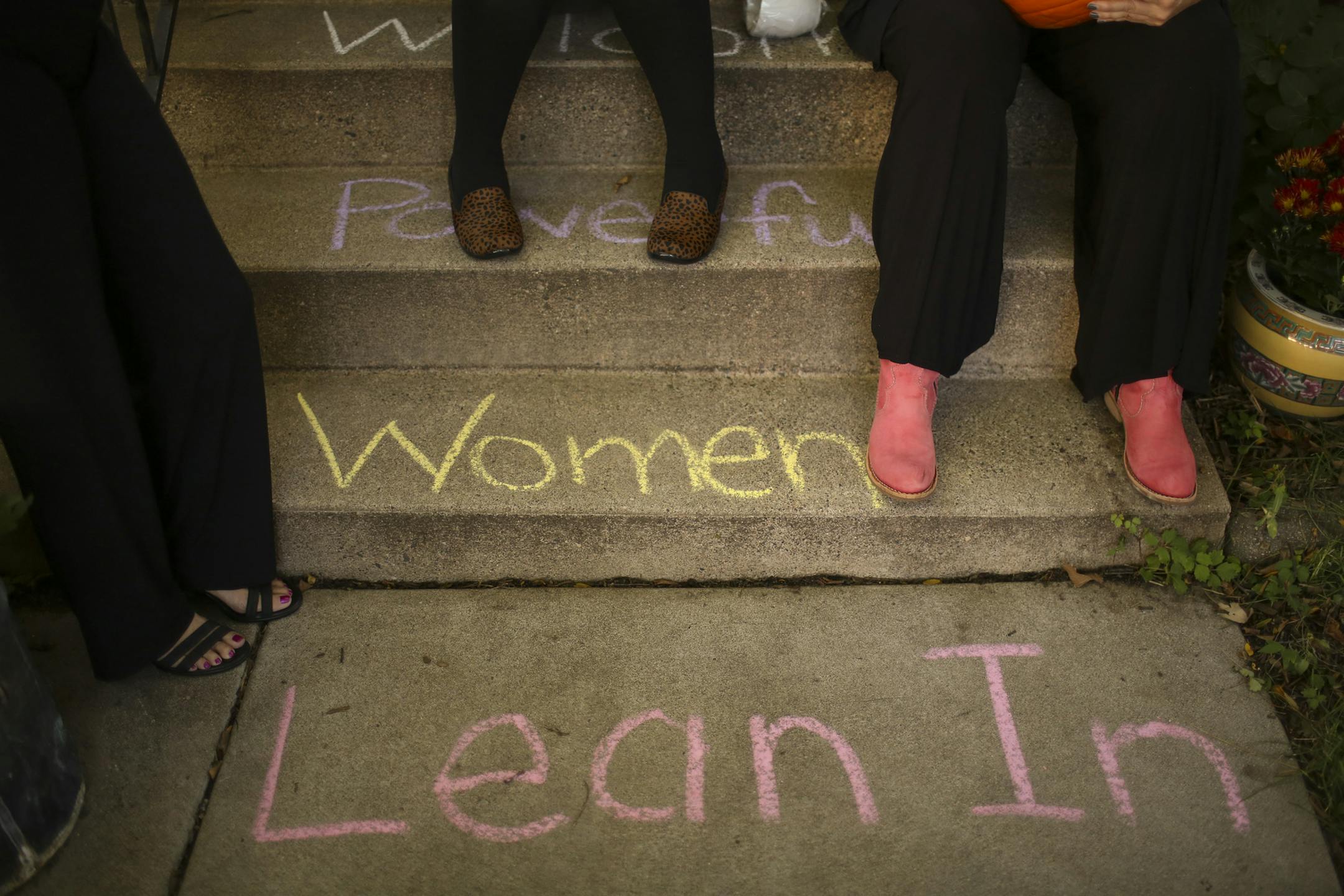 Sheryl Sandberg, CEO of Facebook and author of the bestseller Lean In: Women, Work, and the Will to Lead, dropped in on one of the Lean In Circles she inspired in the home of Linda Brandt in Minneapolis Tuesday night, October 1, 2013. Three of the women attending the Lean In circle at Linda Brandt's house waited outside on the front steps, decorated for the occasion, for the meeting to begin. ] JEFF WHEELER &#x201a;&#xc4;&#xa2; jeff.wheeler@startribune.com