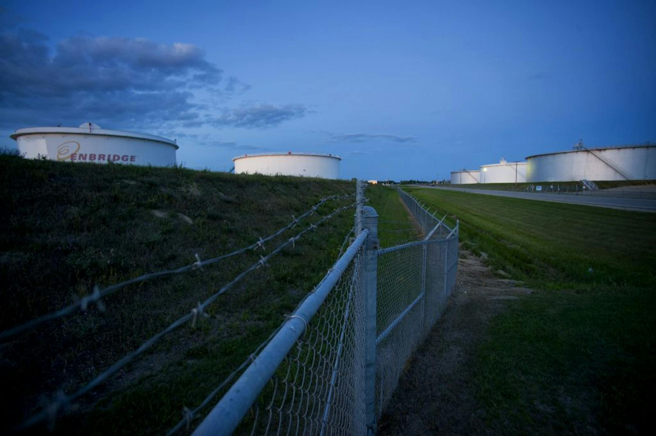 The Clearbrook oil pipeline transfer station in Clearbrook, MN. Storage tanks for Enbridge Energy on the left side and Minnesota Pipeline Company, owned by Koch Energy on the right. Approximately 3.5 million gallons of mostly Canadian crude flows through Clearbrook each day including Tar Sands oil. Tuesday, August 14, 2012.