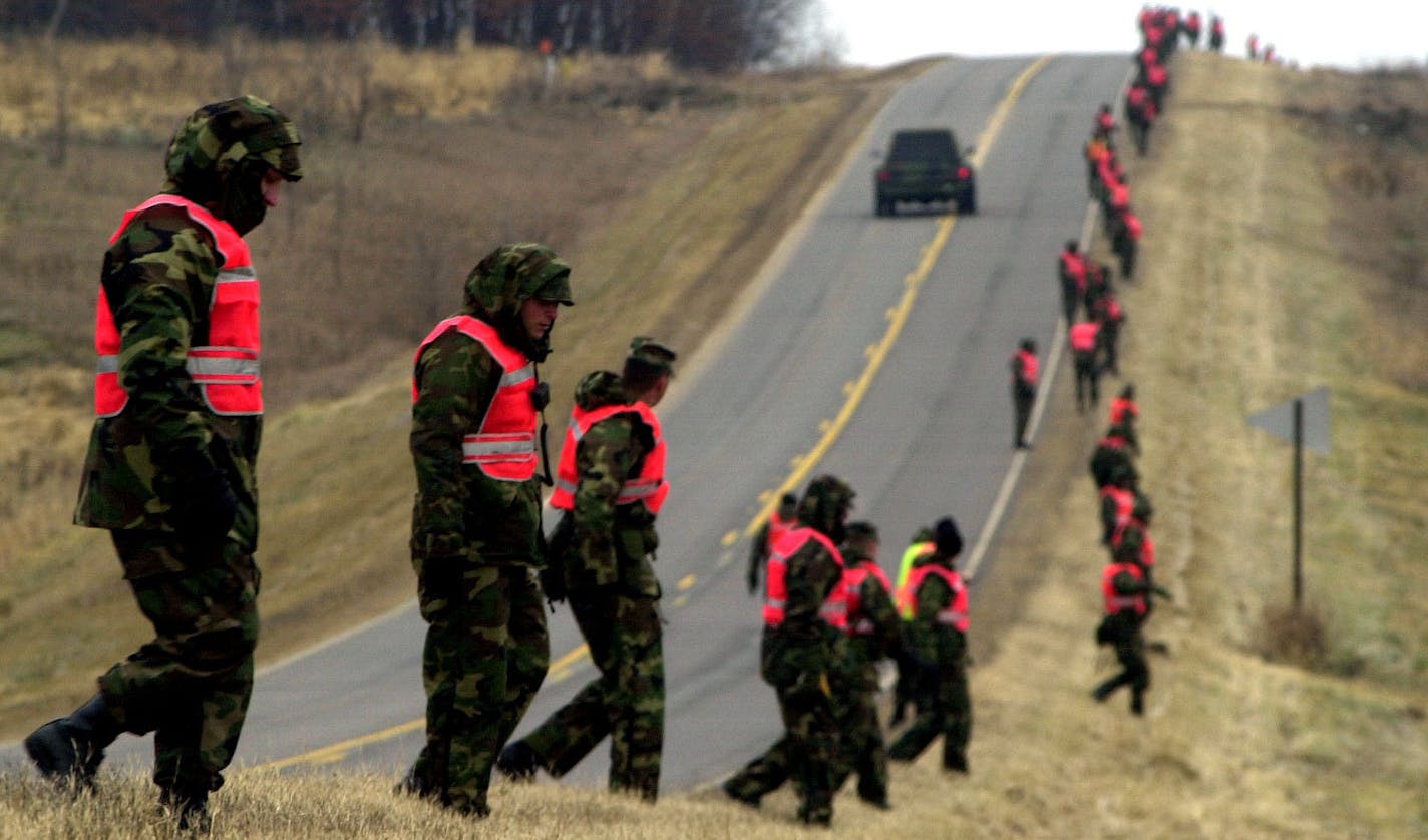 Collegeville,Mn. Wednesday 11/13/02 - Governor Ventura has requested National Guard members to Collegeville to help search for missing St. John's College student Josh Guimond The National Guard began a line search along Hwy 51 in Collegeville,MN. There were a bout 100 Guard involved in the search, along with about 30 friends and family.