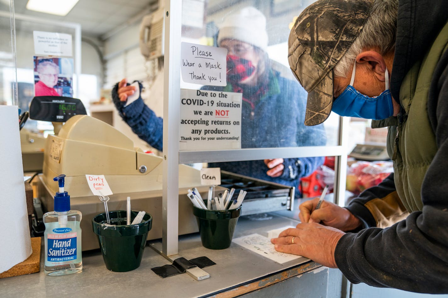 Bob Nunemacher, of La Crescent bought apples from Bauer's Market, which has signs telling people to wear masks in the store due to the pandemic. "I think everybody should follow the guidelines not just to protect yourself, but other people," said Nunemacher.