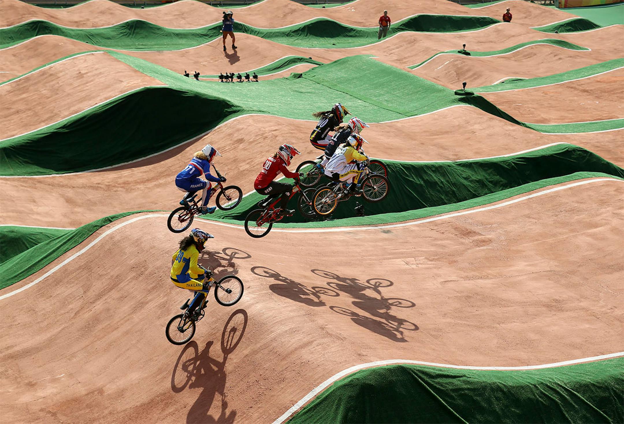 St. Cloud's Alise Post (top center) flies over the jumps during her 3rd semifinal heat on her way to a silver medal in the women's BMX cycling Friday afternoon during the 2016 Summer Olympics in Rio de Janeiro, Brazil.