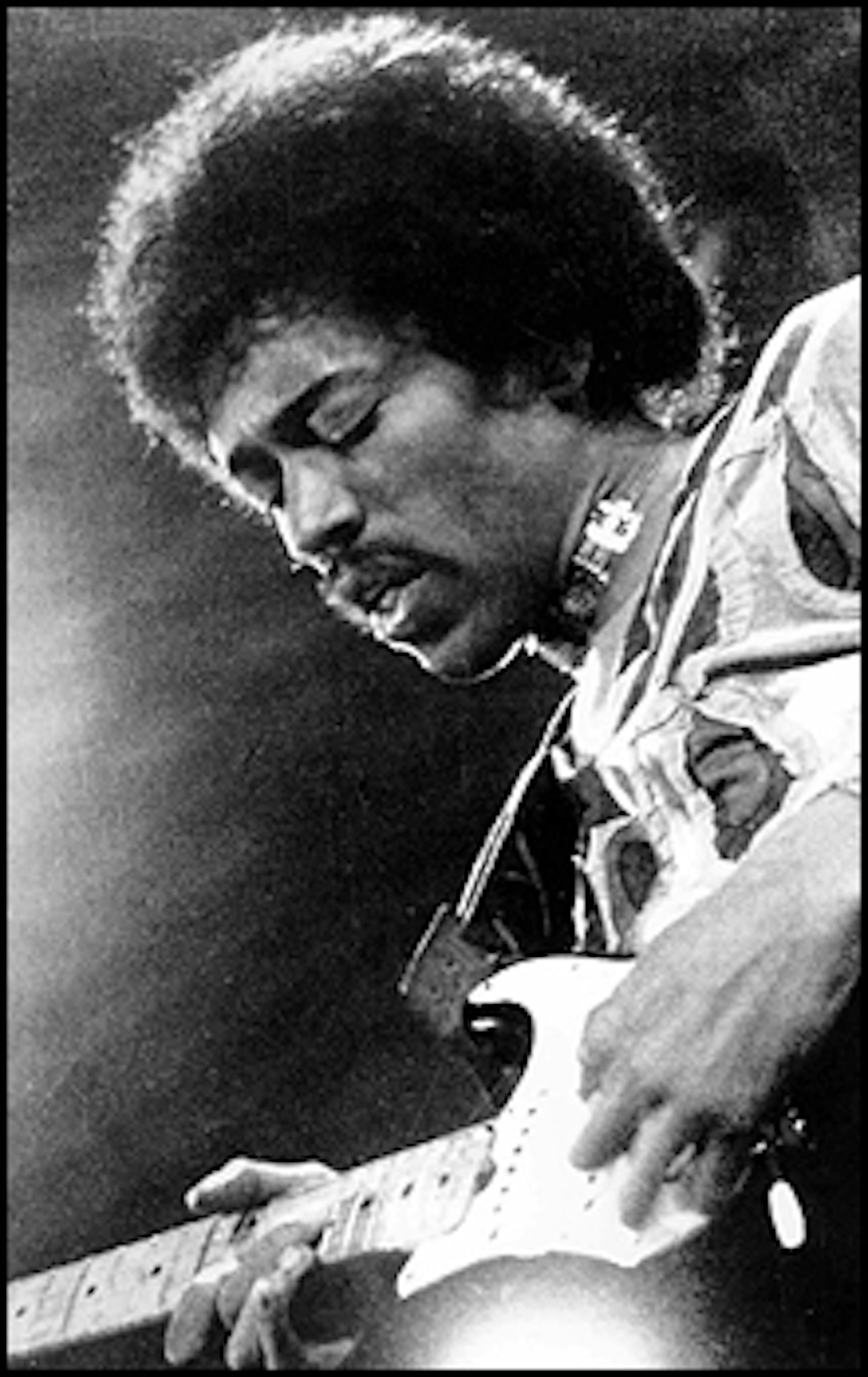 Jimi Hendrix performs in this 1970 file photo on the Isle of Wight in England.