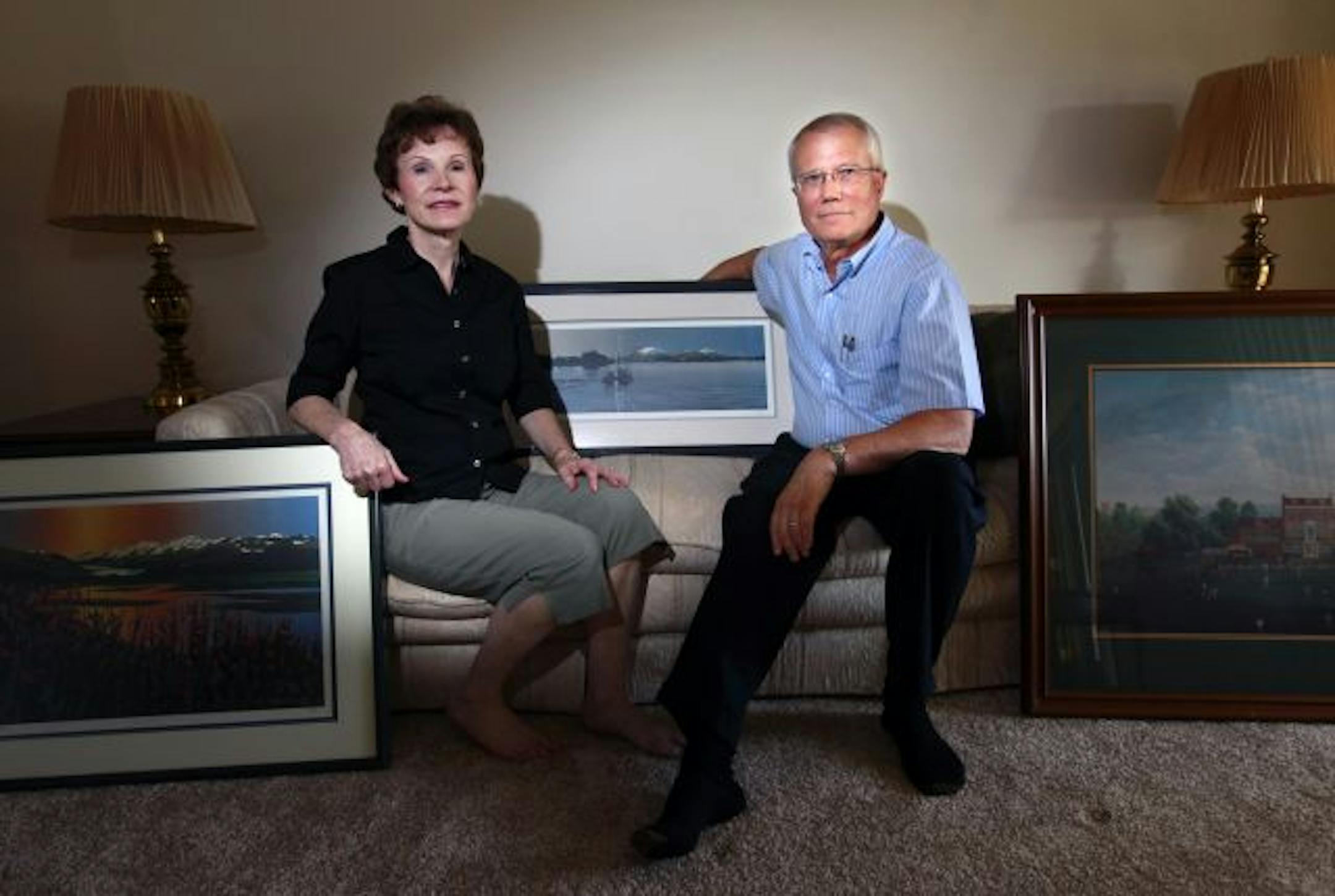 Gloria and Joel Meyer have lowered the asking price and tried staging with art work to enhance the appeal of their Plymouth home. They say interest dropped when the buyers' tax credit ended in April.