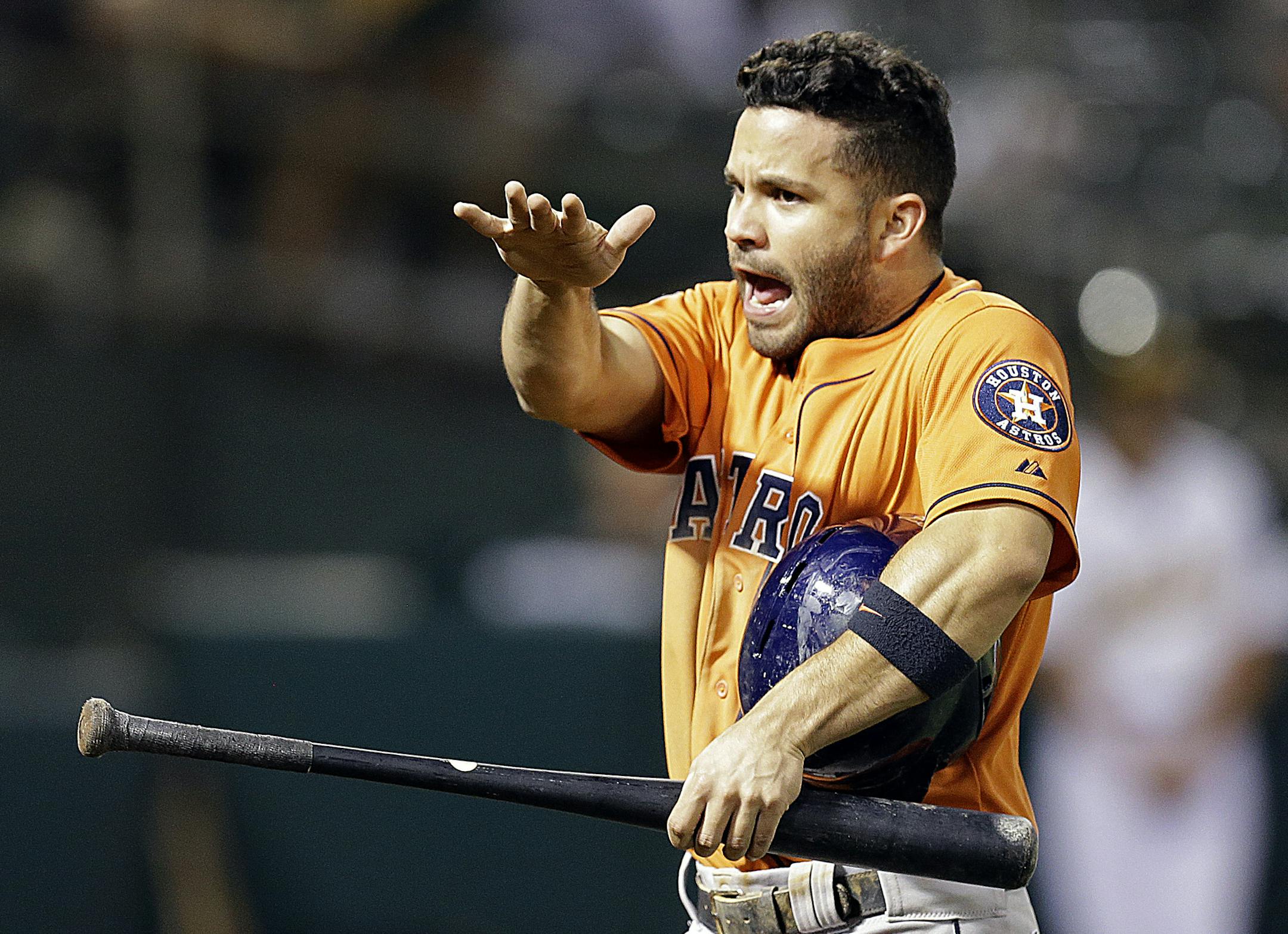 Houston Astros' Jose Altuve celebrates after scoring against the Oakland Athletics in the tenth inning of a baseball game Thursday, Aug. 6, 2015, in Oakland, Calif. (AP Photo/Ben Margot) ORG XMIT: MIN2015082719582540