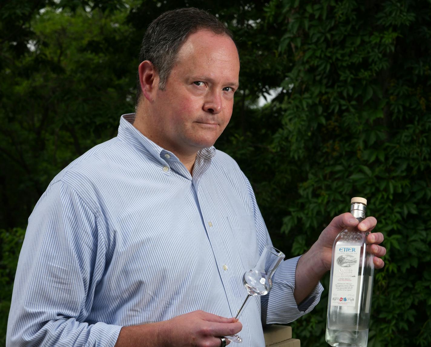 Eric Seed, who has cast a net far and wide for distinctive, delicious wines and spirits and brings them to the Twin Cities thanks to his importing business Haus Alpenz, stands for a portrait Thursday, July 7, 2022 at his home in Edina, Minn. ] ANTHONY SOUFFLE • anthony.souffle@startribune.com