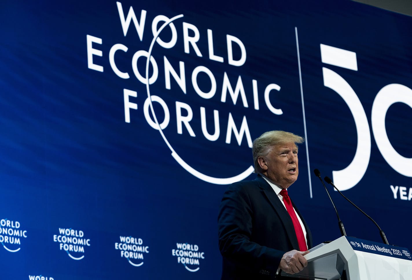 President Donald Trump delivers opening remarks at the World Economic Forum in Davos, Switzerland, Jan. 21, 2020. Neither uttered the other&#x2019;s name, but Trump and the Swedish climate campaigner Greta Thunberg took unmistakable aim at each other on Tuesday at this conference of business and government figures, reprising their roles as antagonists on the global stage. (Anna Moneymaker/The New York Times)