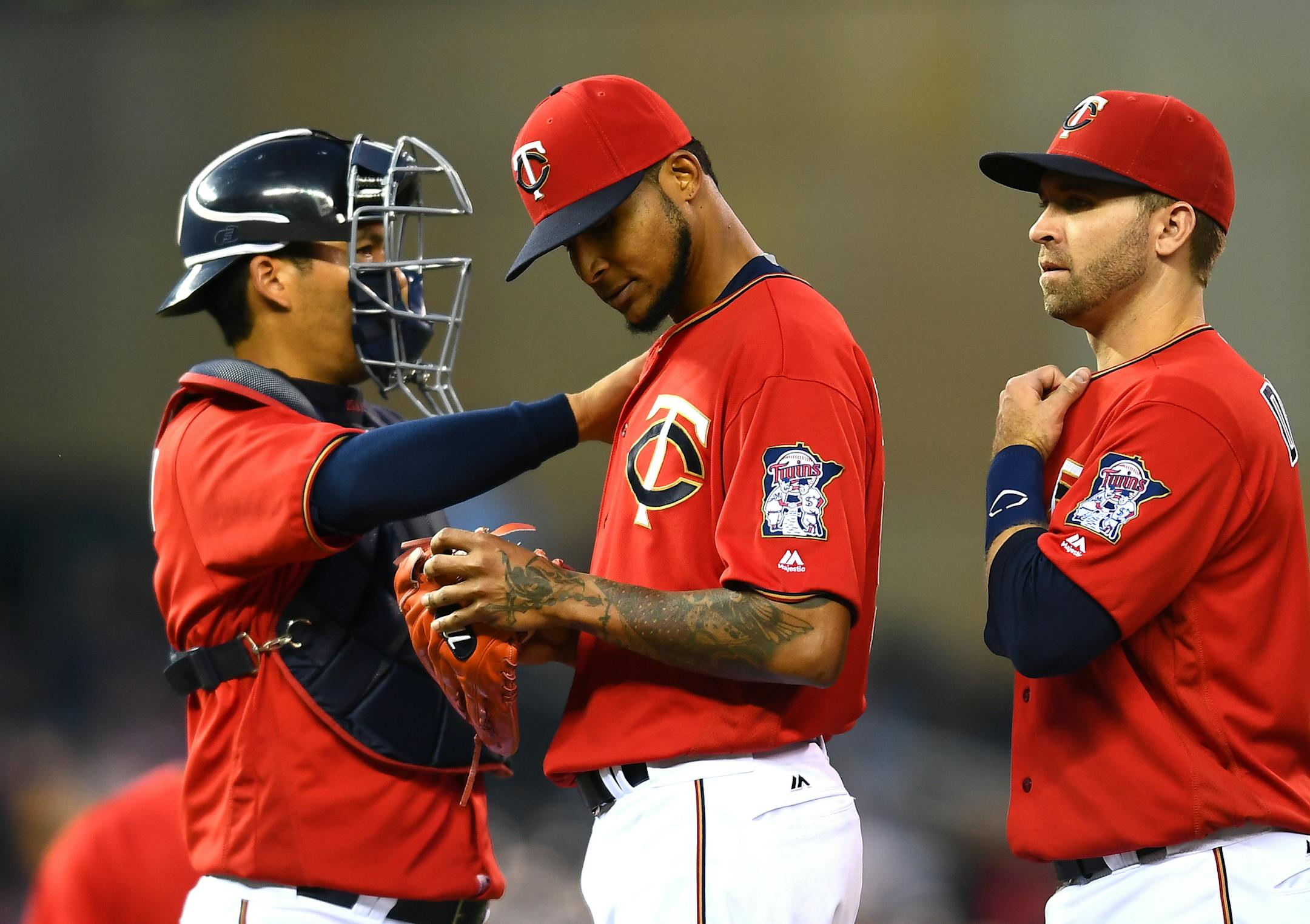Minnesota Twins catcher Kurt Suzuki (8) patted starting pitcher Ervin Santana (54) on the shoulder as Santana was pulled from the mound in the top of the sixth inning Friday against the Cleveland Indians. ] (AARON LAVINSKY/STAR TRIBUNE) aaron.lavinsky@startribune.com The Minnesota Twins played the Cleveland Indians on Friday, July 15, 2016 at Target Field in Minneapolis, Minn.