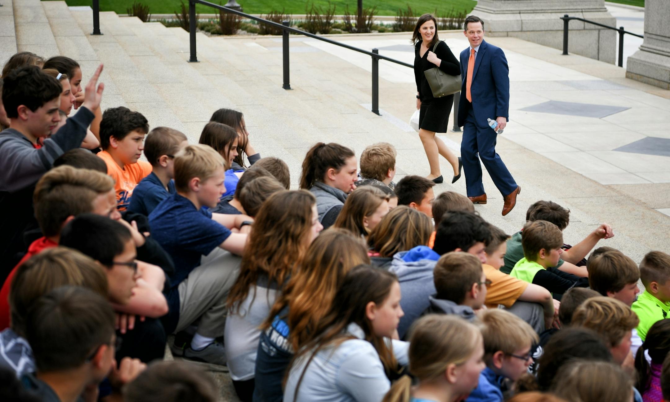 Ben Golnik and Susan Closmore walked up the Capitol steps, back to work after lunch, past groups of school students on a field trip.