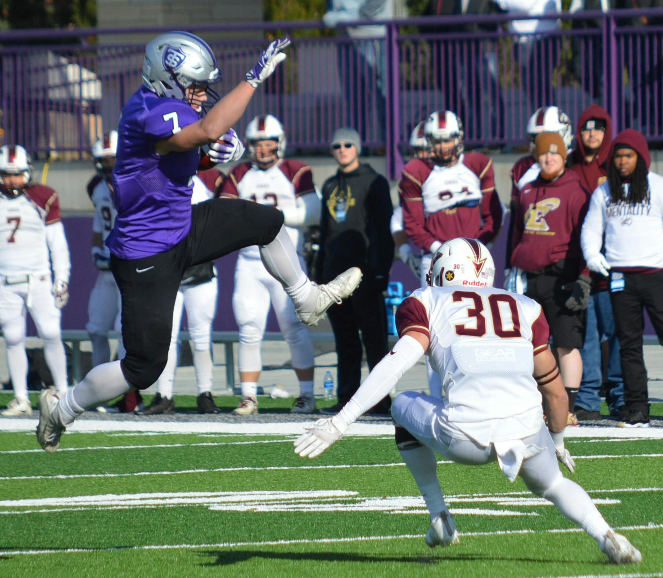 Itís St. Thomas freshman receiver Tom Loeffler and Eureka defensive back Ross Royal during their NCAA Division III playoff game Saturday Nov. 18 2017. The credit should be B.J. Pickard of the MIAC.