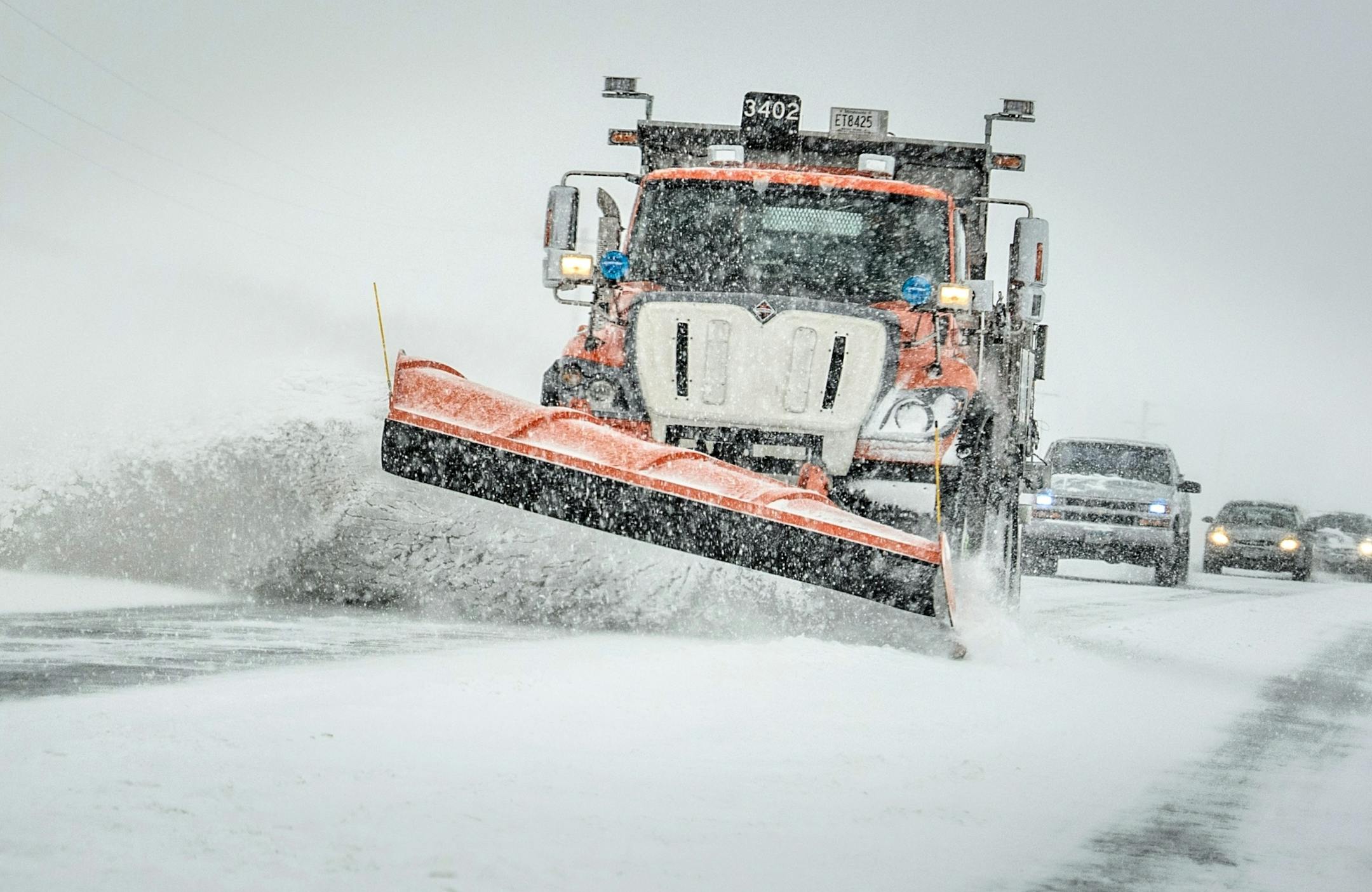 A snowplow on Chippendale Avenue near Farmington, MN.