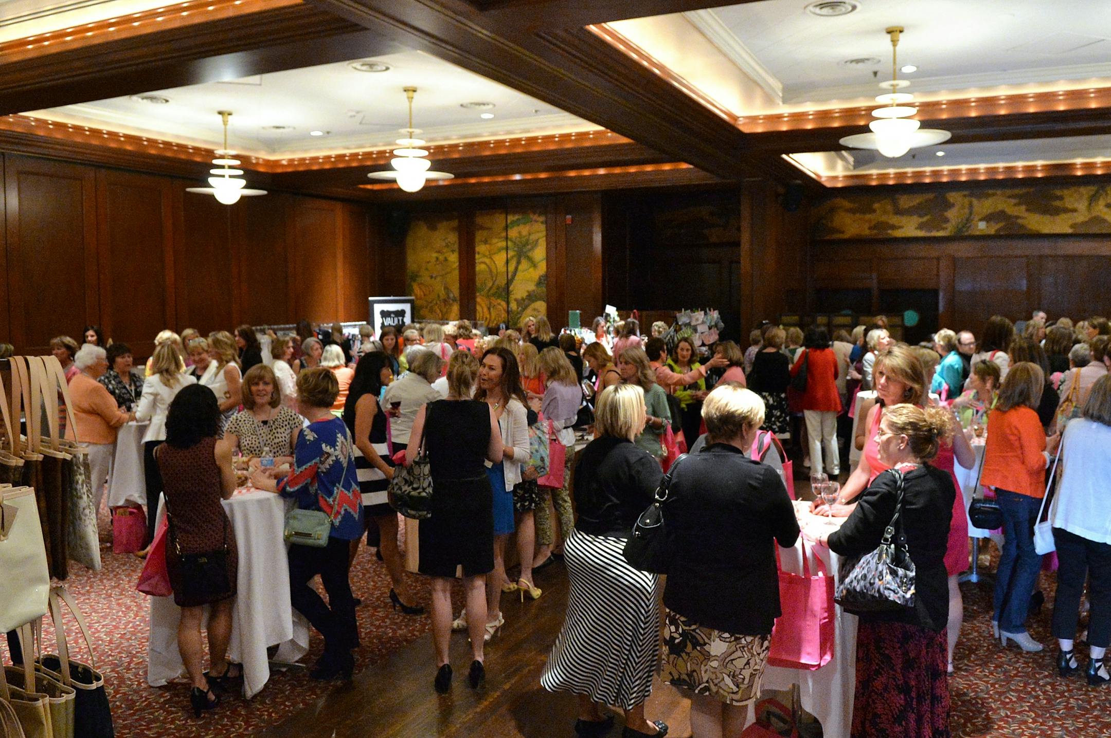Vendors set up shop at the Metropolitan Ballroom in Golden Valley selling various clothing items, jewelry and home goods.