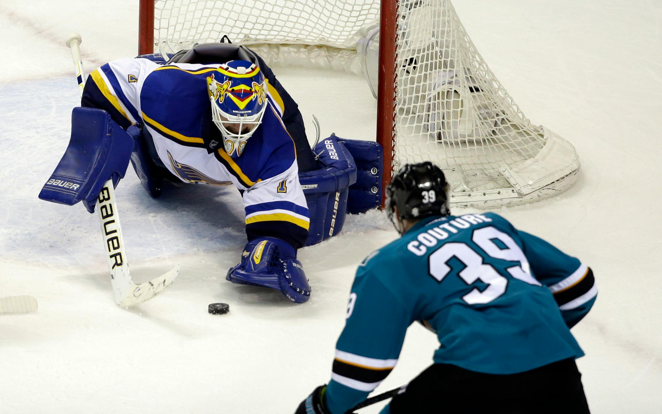 Blues goalie Brian Elliott will try to hold off Logan Couture and the hard-charging Sharks in the Western Conference finals. Game 1 is Sunday night in St. Louis.