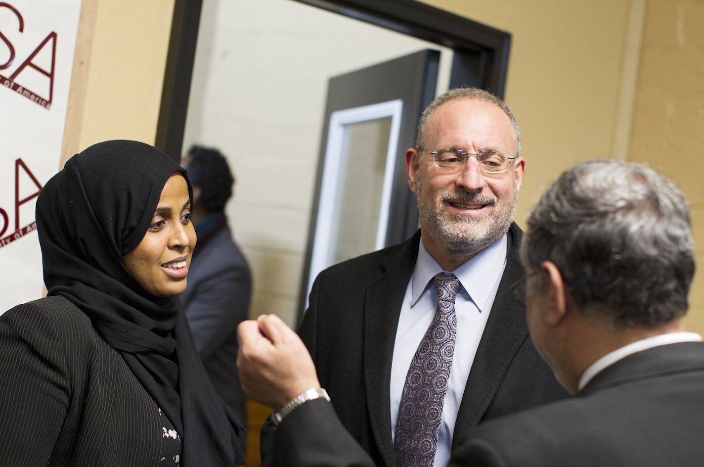 Co-chairwoman Hodan Hassan, left, and U.S. Attorney Andrew Luger spoke with guests at Monday&#x2019;s community meeting in Minneapolis to address the problem of Islamophobia.