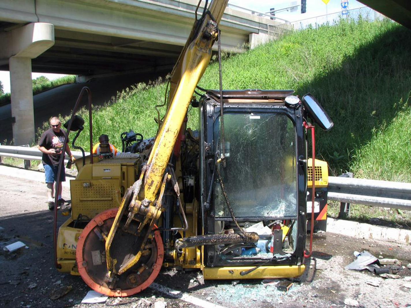 This crane toppled from a semi in Moorhead after striking an overpass.