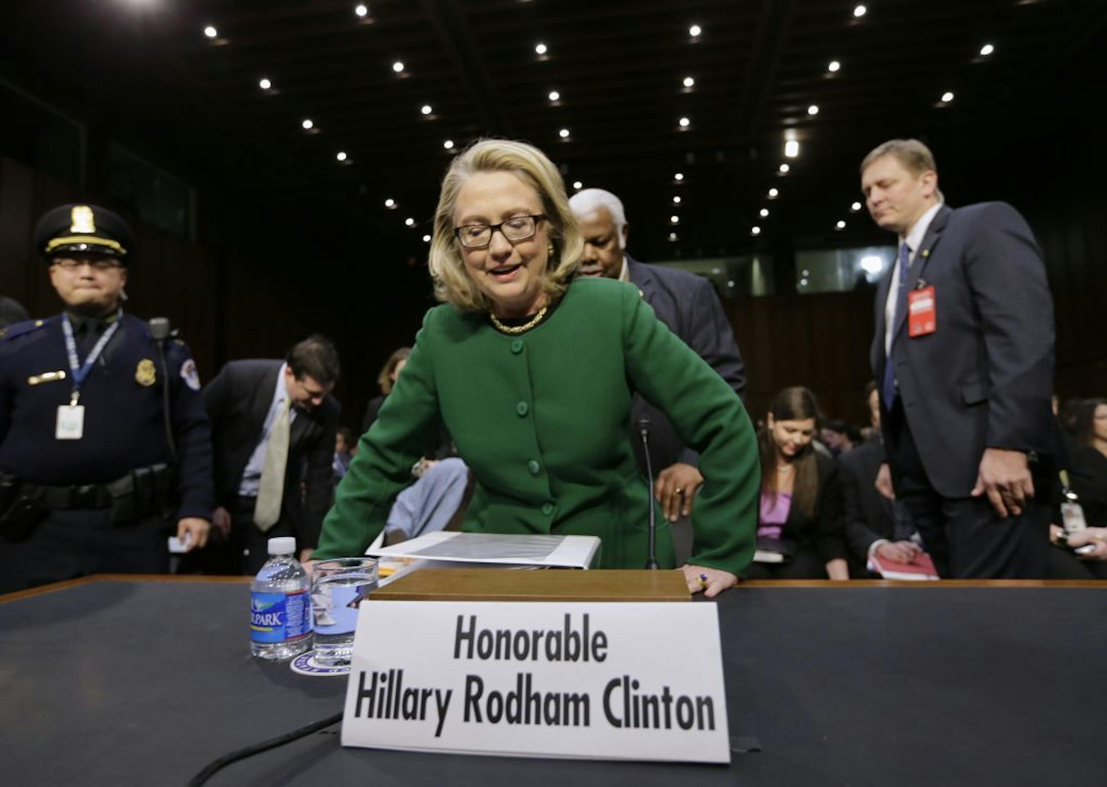 Secretary of State Hillary Rodham Clinton takes her seat on on Capitol Hill in Washington, Wednesday, Jan. 23, 2013, prior to testifying before the Senate Foreign Relations Committee hearing on the deadly September attack on the U.S. diplomatic mission in Benghazi, Libya, that killed Ambassador Chris Stevens and three other Americans.