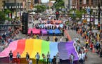 The annual Twin Cities Pride Festival and its big Sunday parade draw big crowds to downtown Minneapolis.