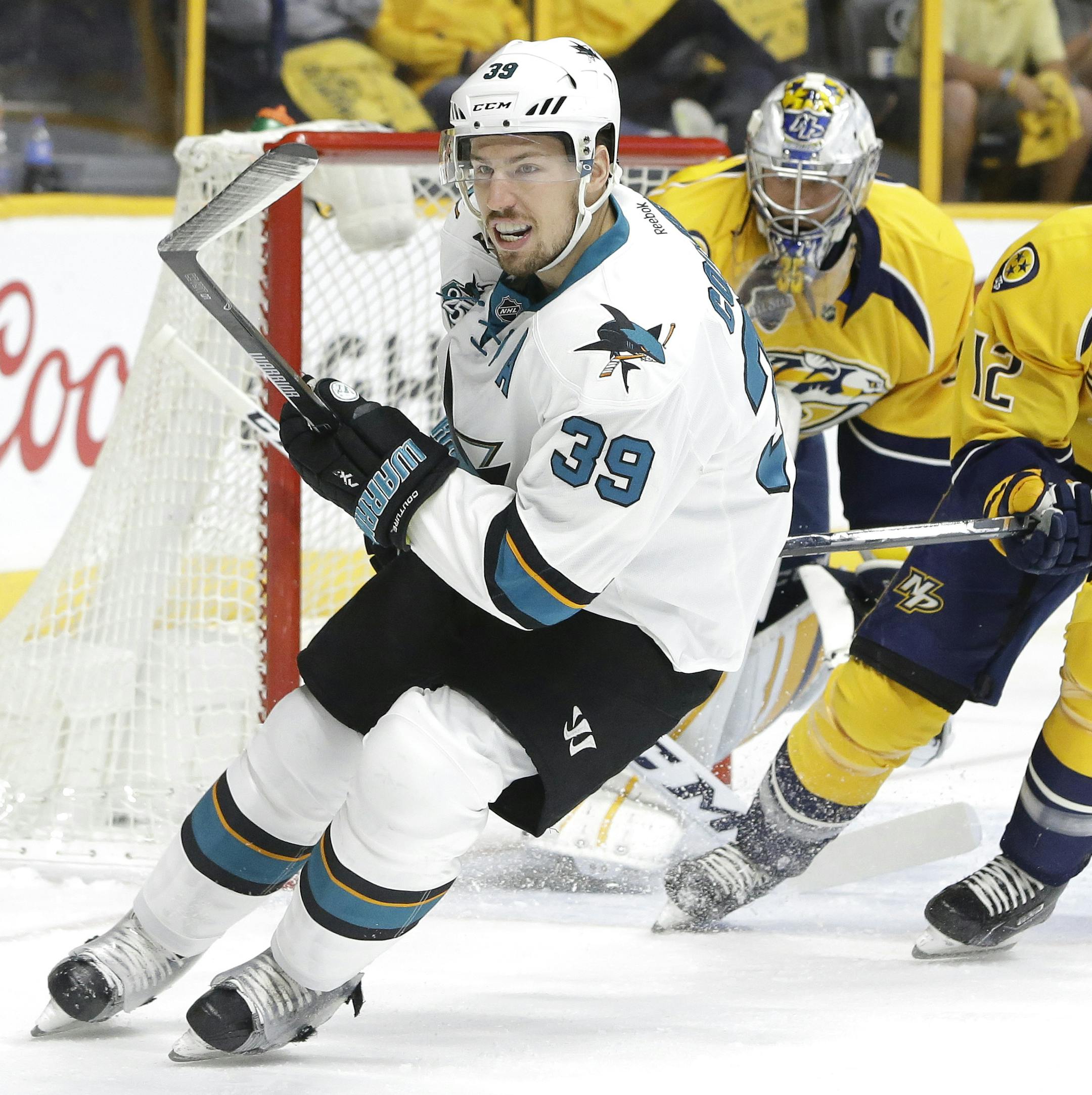 San Jose Sharks center Logan Couture (39) plays against Nashville Predators forward Mike Fisher (12) during the first period in Game 6 of an NHL hockey Stanley Cup Western Conference semifinal playoff series Monday, May 9, 2016, in Nashville, Tenn. (AP Photo/Mark Humphrey) ORG XMIT: TNMH1