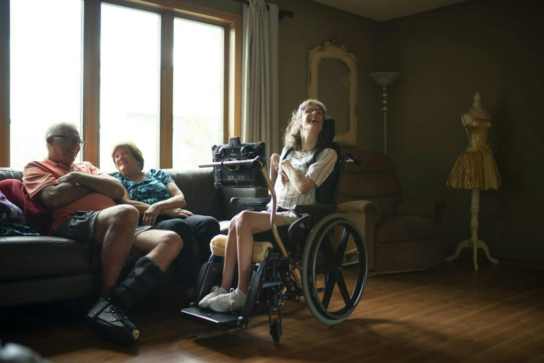 Kari Wagner laughed while she visited with her parents, Nancy and Gary, at her home in Golden Valley.