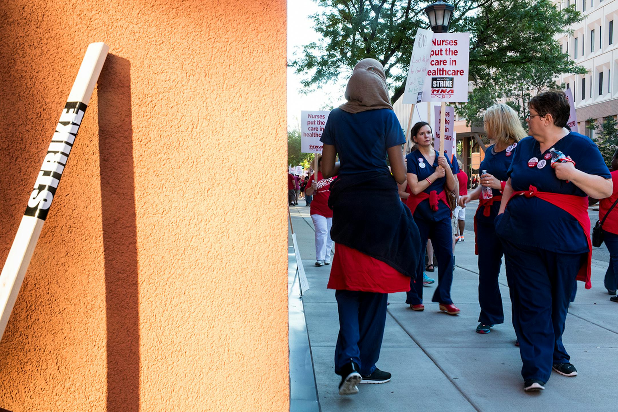 Nurses picket in front of United Hospital in St. Paul.