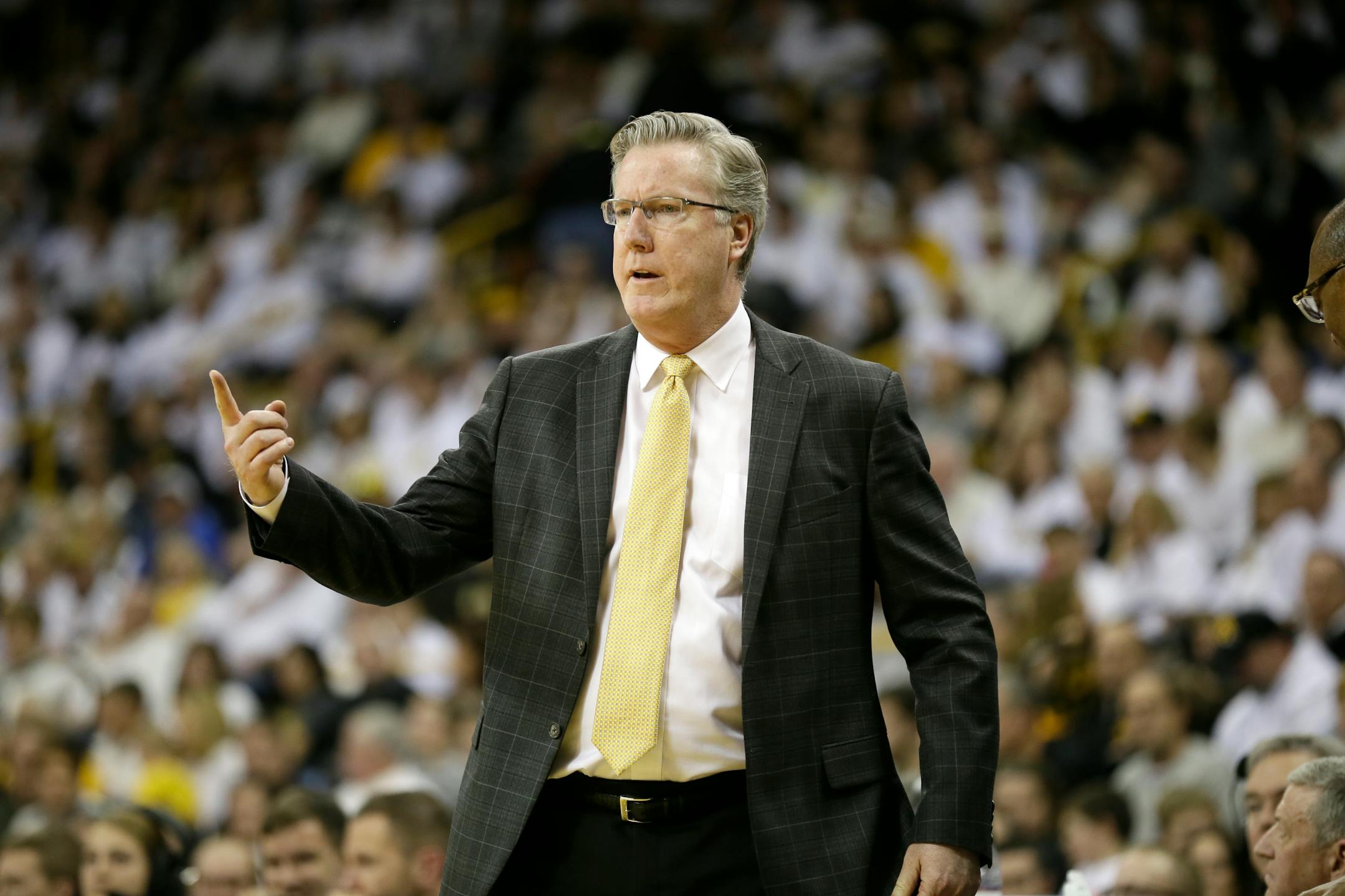 Iowa head coach Fran McCaffery directs his team during the second half of an NCAA college basketball game against Michigan, Sunday, Jan. 17, 2016, in Iowa City, Iowa. Iowa won 82-71. (AP Photo/Charlie Neibergall)