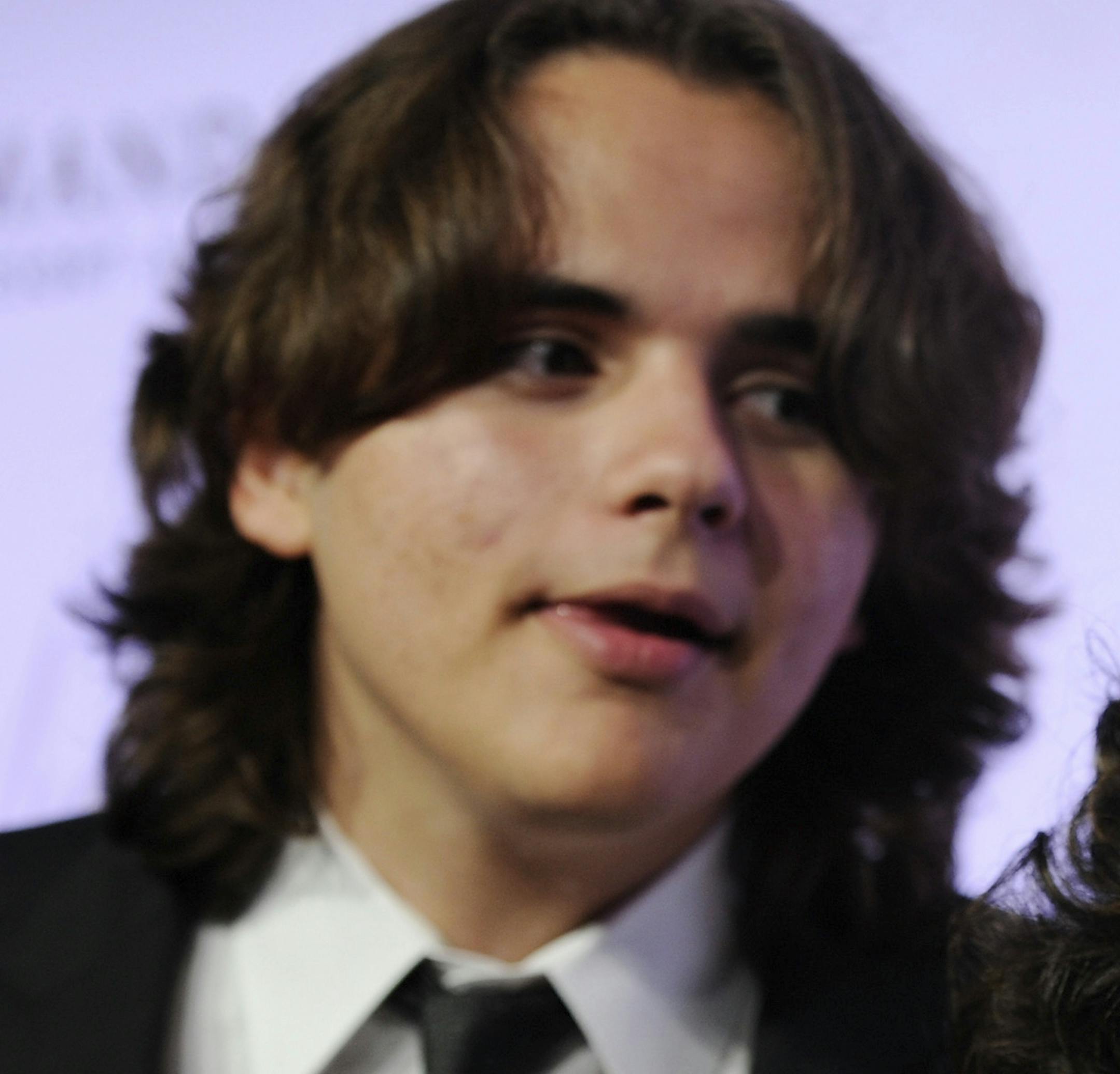 FILE - In this June 29, 2013 file photo, Prince Jackson, left, and Katherine Jackson arrive at the world premiere of "Michael Jackson ONE" at THEhotel at Mandalay Bay Resort and Casino in Las Vegas. Prince Jackson unveiled a tattoo tribute to his late father, Michael, in an Instagram post on March 31, 2017. (Photo by David Becker/Invision/AP, File)