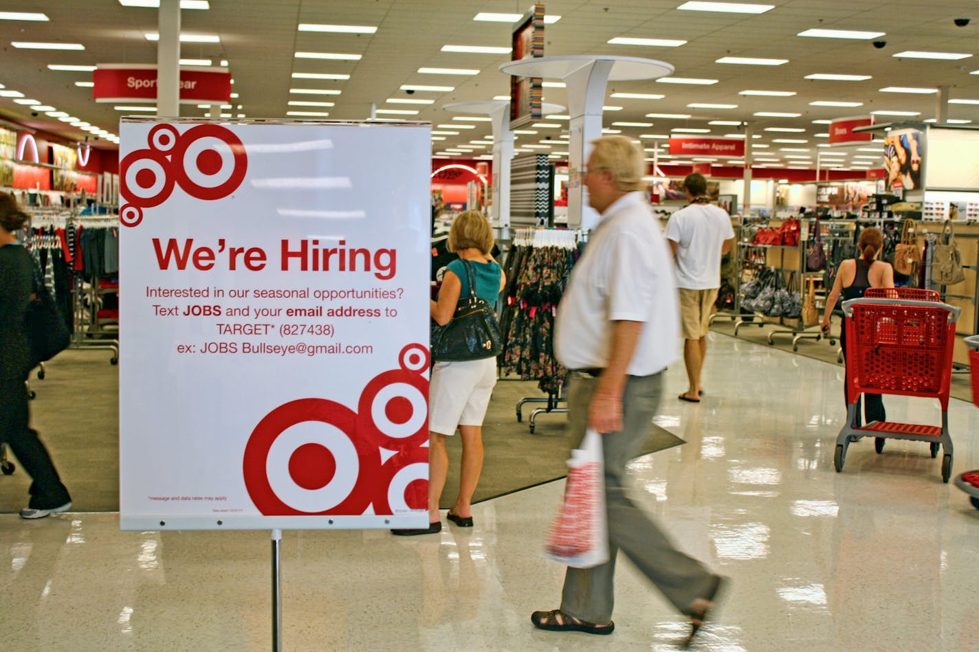 Target is among the companies using mobile technology to recruit seasonal help. Signs inside select Target locations in South Florida encourage seasonal job seekers to text "JOBS" and an email address to "Target" (827438) for more information. (Justine Griffin/Sun Sentinel/MCT)