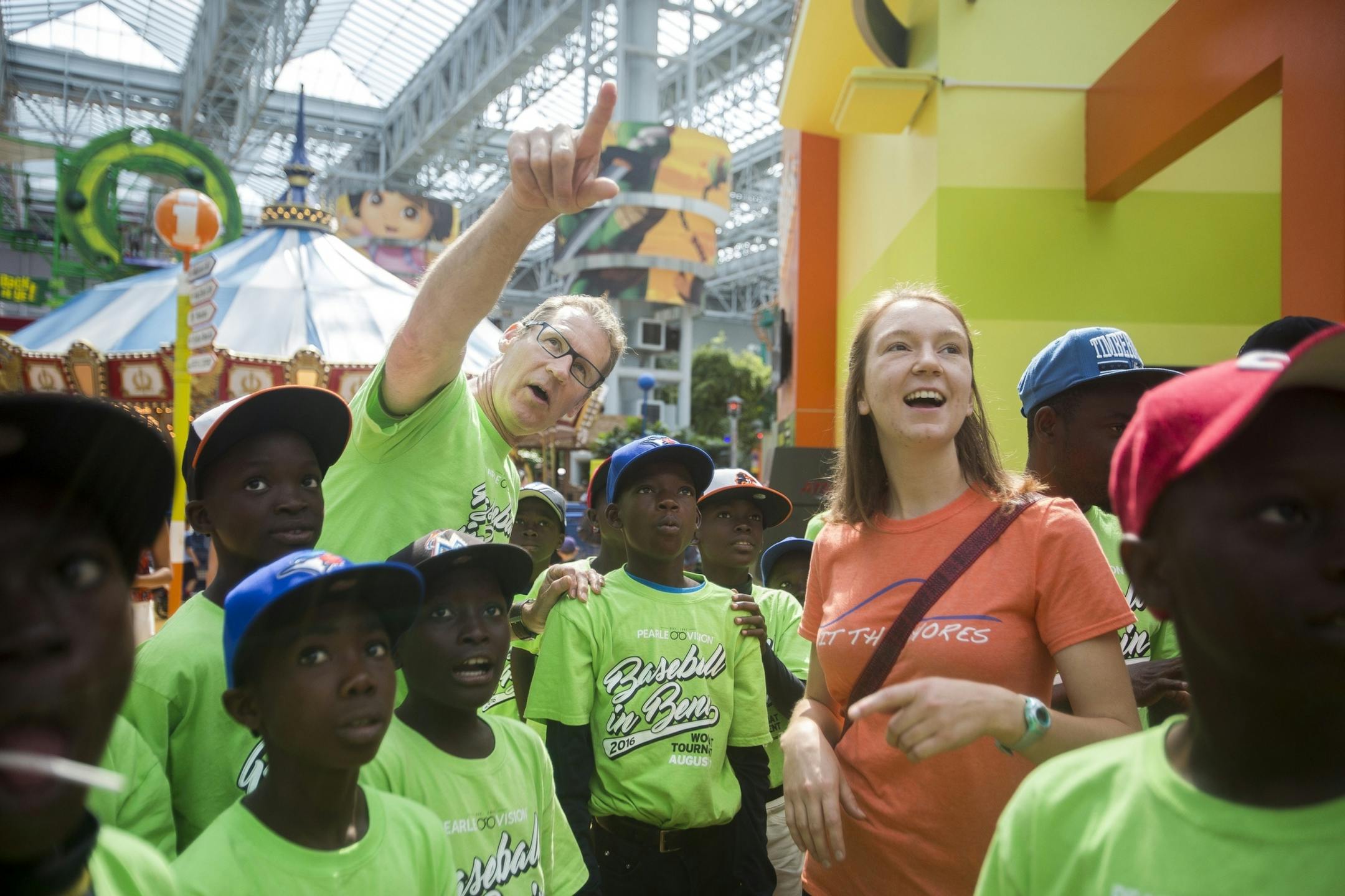 Baseball in Benin president Gary Tonsager, center, points out different rides to Team Benin at the Nickelodeon Universe theme park at the Mall of America on Monday, August 1, 2016 in Bloomington, Minnesota.
