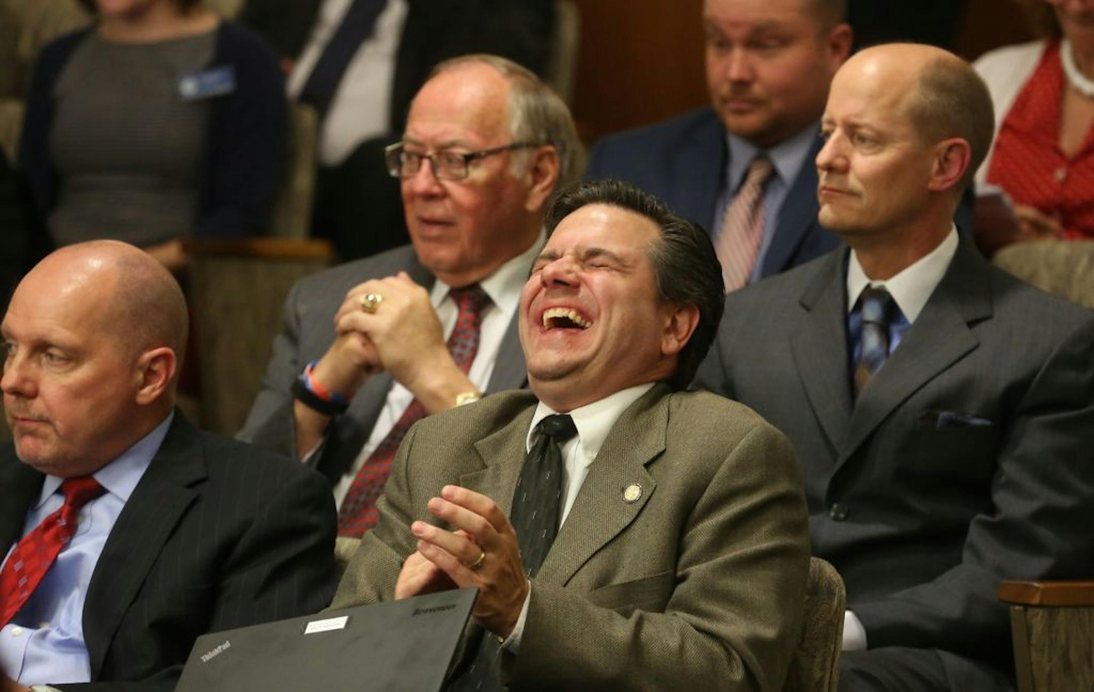 Sean R. Nienow laughed after a small joke before the voting on the agriculture and environment bill. It wound up passing in its original form.