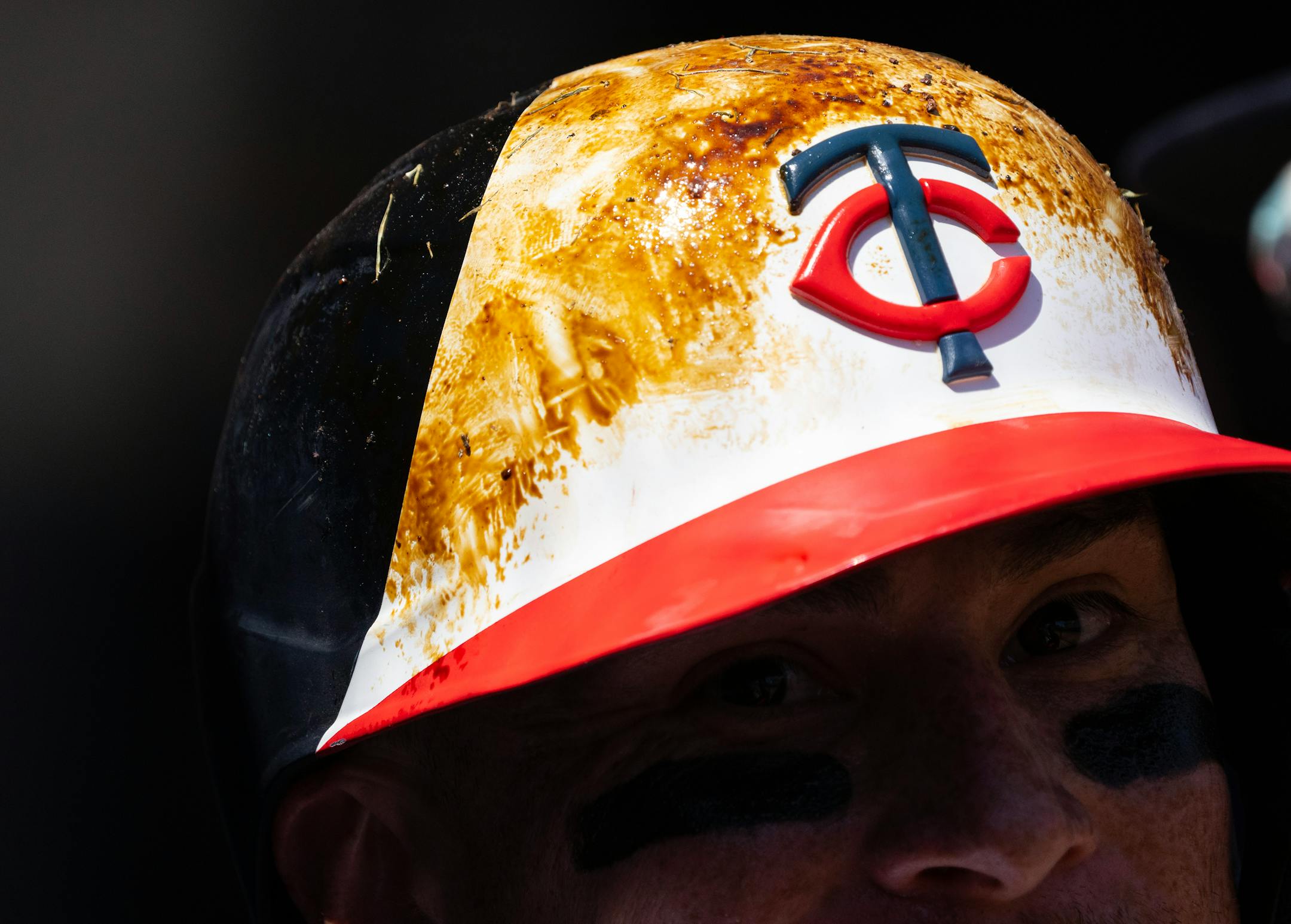 Minnesota Twins catcher Christian Vazquez (8) celebrates in the dugout after scoring against the Detroit Tigers in the second inning.