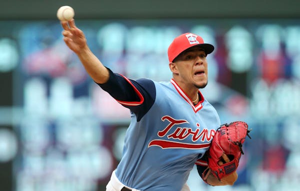 Minnesota Twins pitcher Jose Berrios throws against the Oakland Athletics in the first inning of a baseball game Sunday, Aug. 26, 2018, in Minneapolis