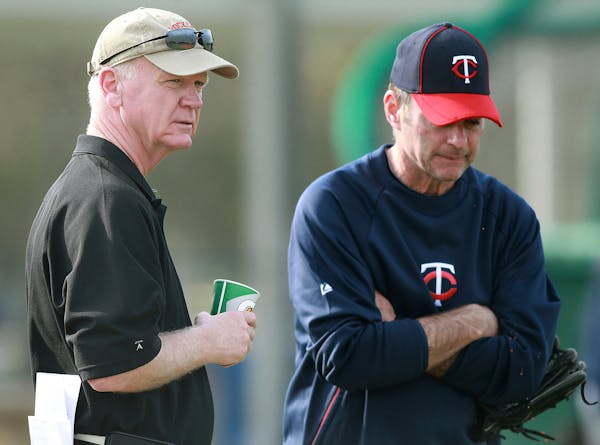 General Manager Terry Ryan, left, and manager Paul Molitor chatted in 2012.