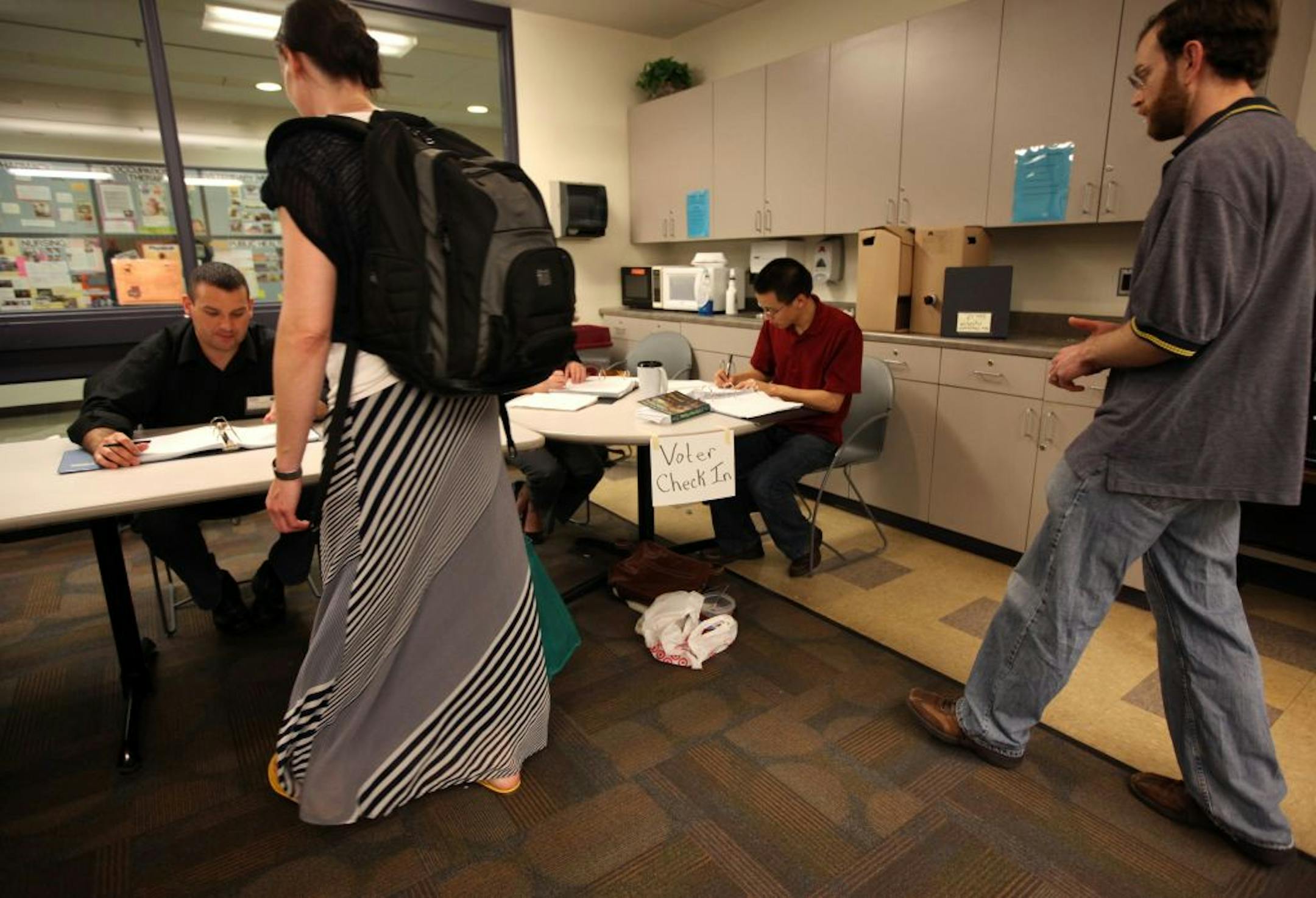 During the first day of voting, graduate student employees cast ballots on union representation at Moos Tower on the University of Minnesota campus.