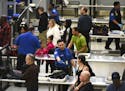 TSA employees workers at Terminal 1 at Minneapolis-St. Paul International Airport in January 2019.