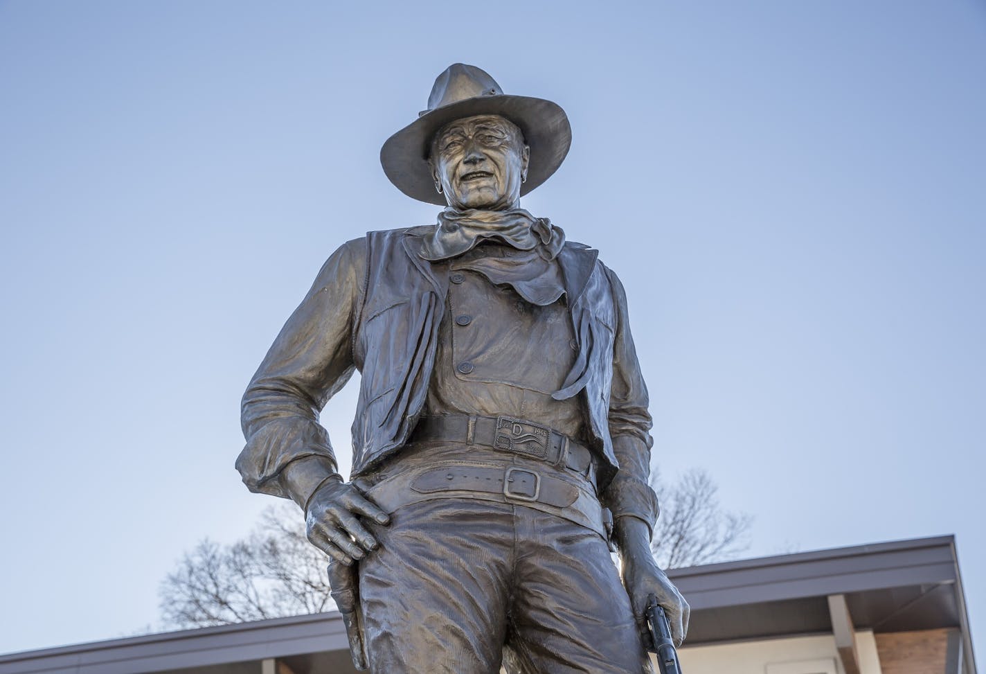 -- PHOTO MOVED IN ADVANCE AND NOT FOR USE - ONLINE OR IN PRINT - BEFORE JAN. 17, 2016. -- A statue of John Wayne at the John Wayne Birthplace and Museum in Winterset, Iowa, Jan. 2, 2016. With the caucuses weeks away, a road trip seems to help reaffirm that the nation, beginning with Iowa, is full of unsung surprises. (Tony Cenicola/The New York Times) ORG XMIT: XNYT136