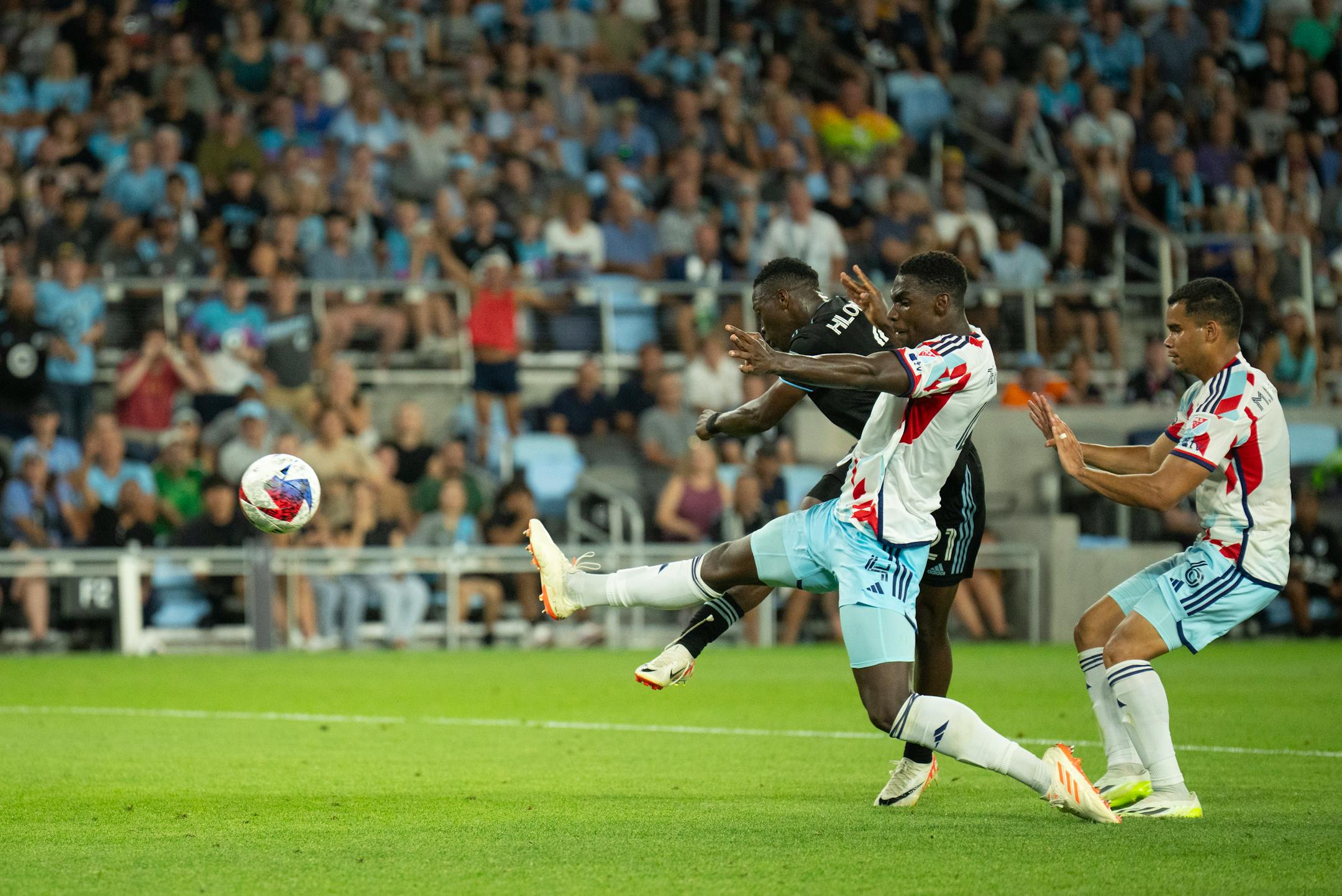 Minnesota United forward Bongokuhle Hlongwane (21) scored his second goal in the second half despite the defensive effort of Chicago Fire defender Carlos Terán (4). The Minnesota United FC faced the Chicago Fire FC in a Leagues Cup 2023 match Thursday night, July 27, 2023 at Allianz Field in St. Paul. ] JEFF WHEELER • jeff.wheeler@startribune.com