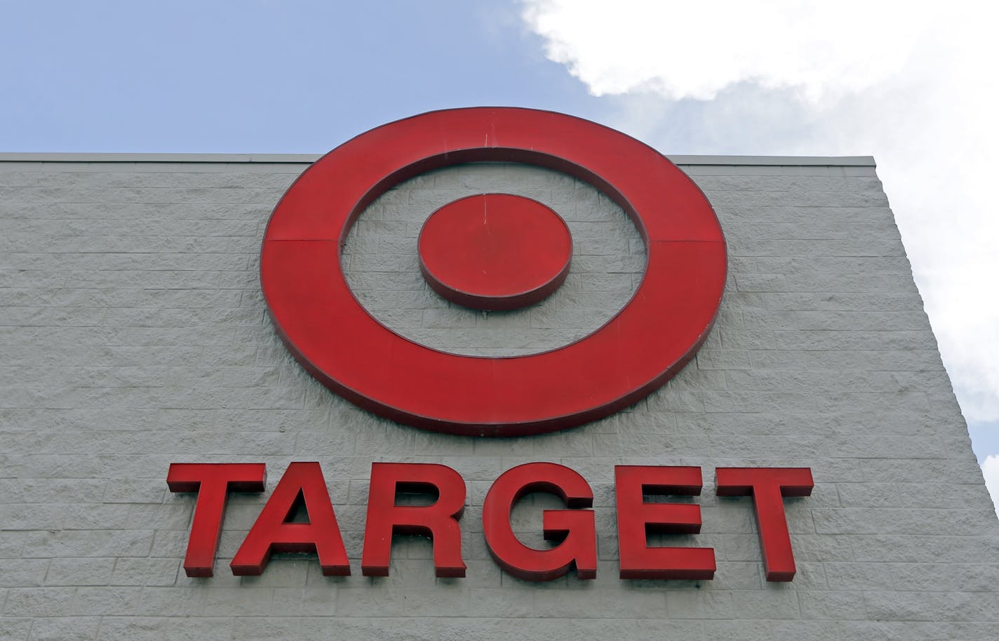 FILE - This June 29, 2016 file photo shows a Target store in Hialeah, Fla. Target shoppers took full advantage of the retailer&#x2019;s pickup and drive up services over the holiday season, climbing 60 percent from a year earlier and making up a quarter of the chain&#x2019;s online sales for the November-December period. Target Corp. also announced Thursday, Jan. 9, 2019 that sales at stores open at least a year increased 5.7 percent in the period, up from 3.4 percent a year earlier. (AP Photo/A