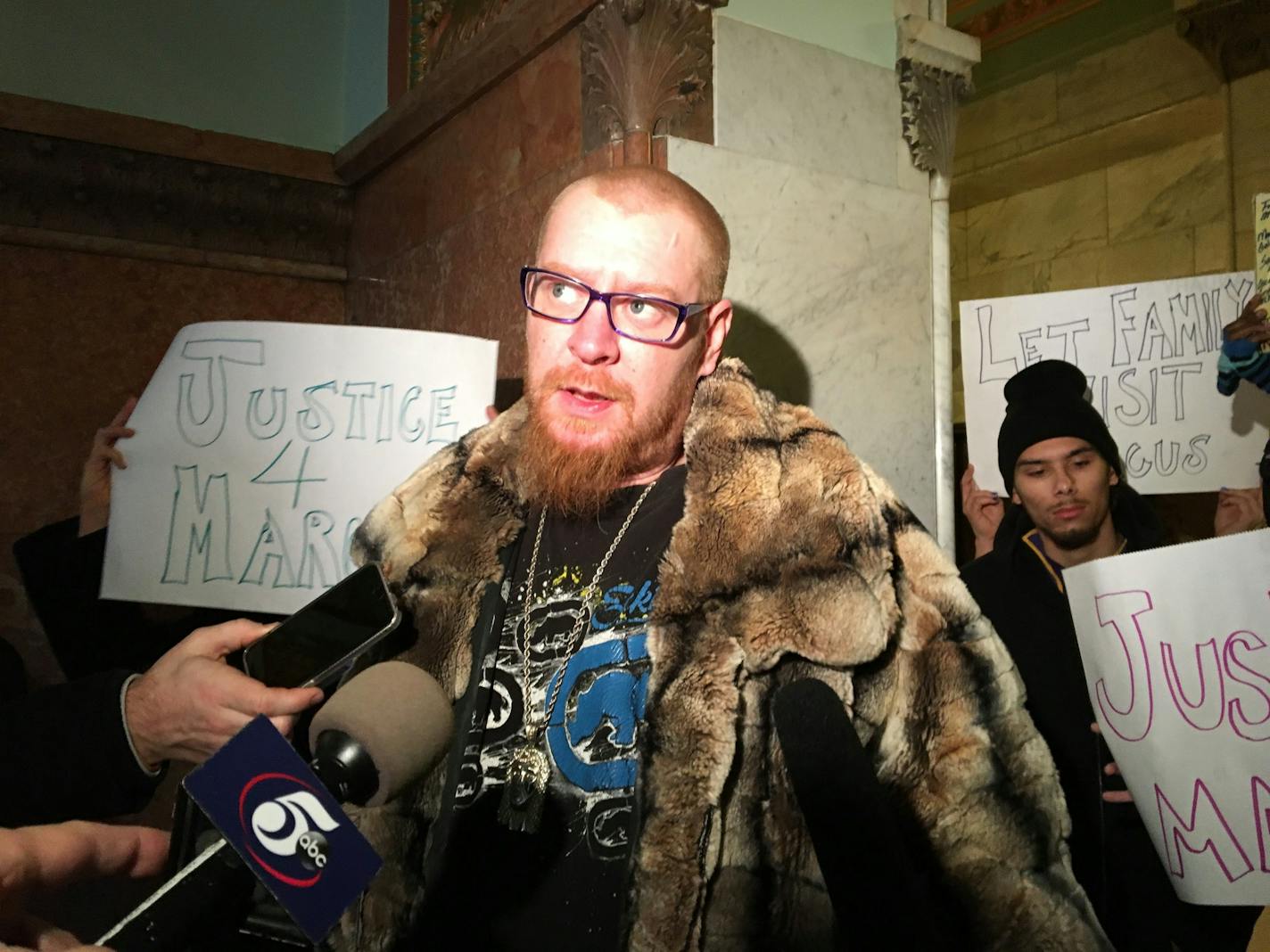 Photo by Beena Raghavendran: Eric Fischer, father of Marcus Fischer, who was shot and wounded by Minneapolis police this week, spoke Friday at a small protest.