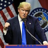 Republican presidential candidate Donald Trump describes how he was ready to punch a person who rushed the stage during an election rally earlier in the day, as he speaks to a crowd in Kansas City, Mo., Saturday, March 12, 2016. (AP Photo/Nati Harnik)