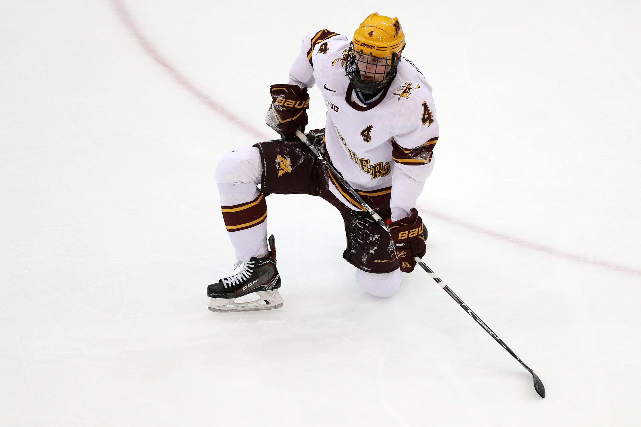Gophers defenseman Steve Johnson reacted after Michigan forward Brendan Warren scored Friday night.