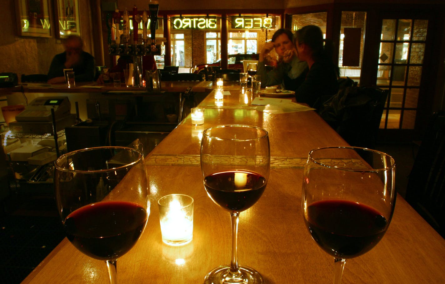 A flight of wine was set on the bar at Beaujo's in Edina, where restaurants weren't allowed to serve alcohol until 1985. Responding to the explosion of brewpubs and taprooms across the Twin Cities, Edina is poised to offer a more spirited experience.