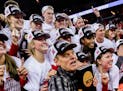 Coach John Cook and his Nebraska Cornhuskers celebrated their national title last year. They'll try to repeat for the first time, but Texas stands in 
