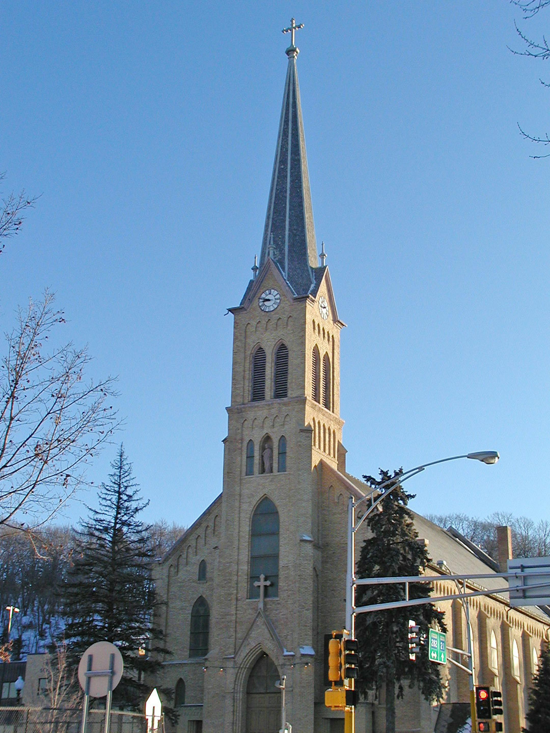 St. John the Baptist Catholic Church in Jordan, MN -- The steeple of the Catholic church in Jordan, the most notable landmark in the older part of town, is so central to the city�s identity that it�s on the city�s official logo. But today there is serious concern that the steeple � heck, the whole church � could tumble to the ground. Two of the main highways in that part of the county intersect right next to the church, and amid rapid growth there�s a plan to modernize that intersection. But chu